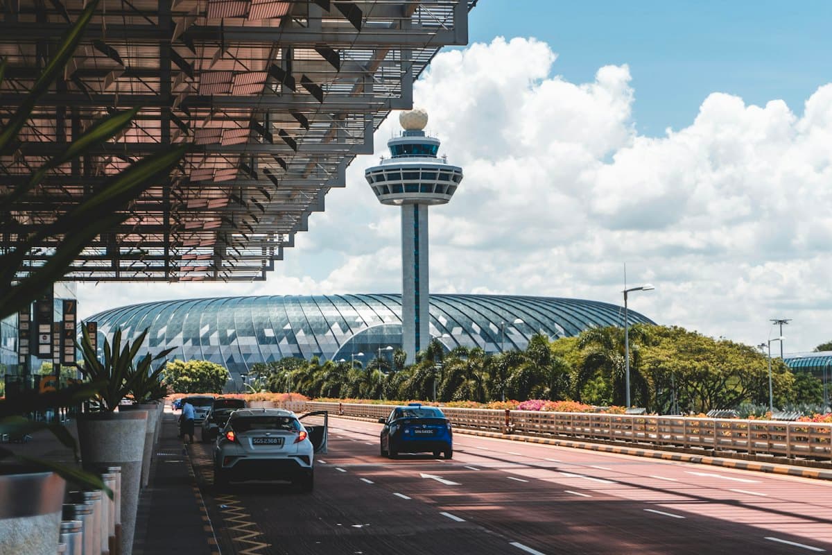 Cars on the approach road to an airport terminal